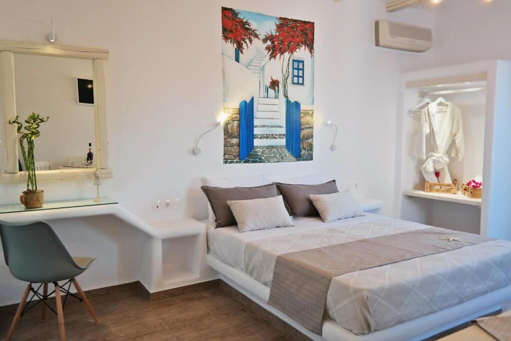 Aphrodite Deluxe Triple with one sofa bed for a child Upper Floor